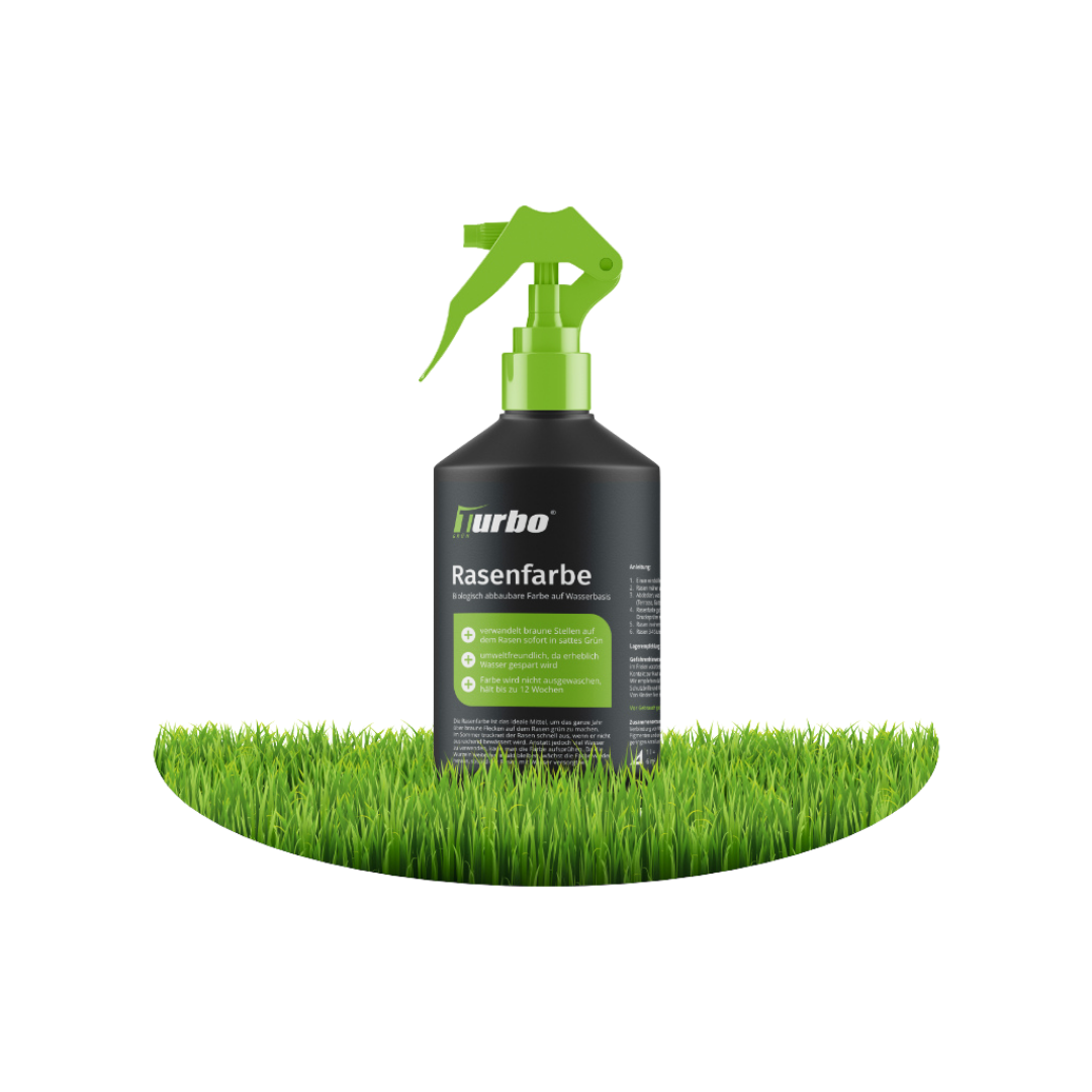Sprühflasche turbogrün Rasenfarbe mit grünem Sprühkopf, dahinter grünes Gras